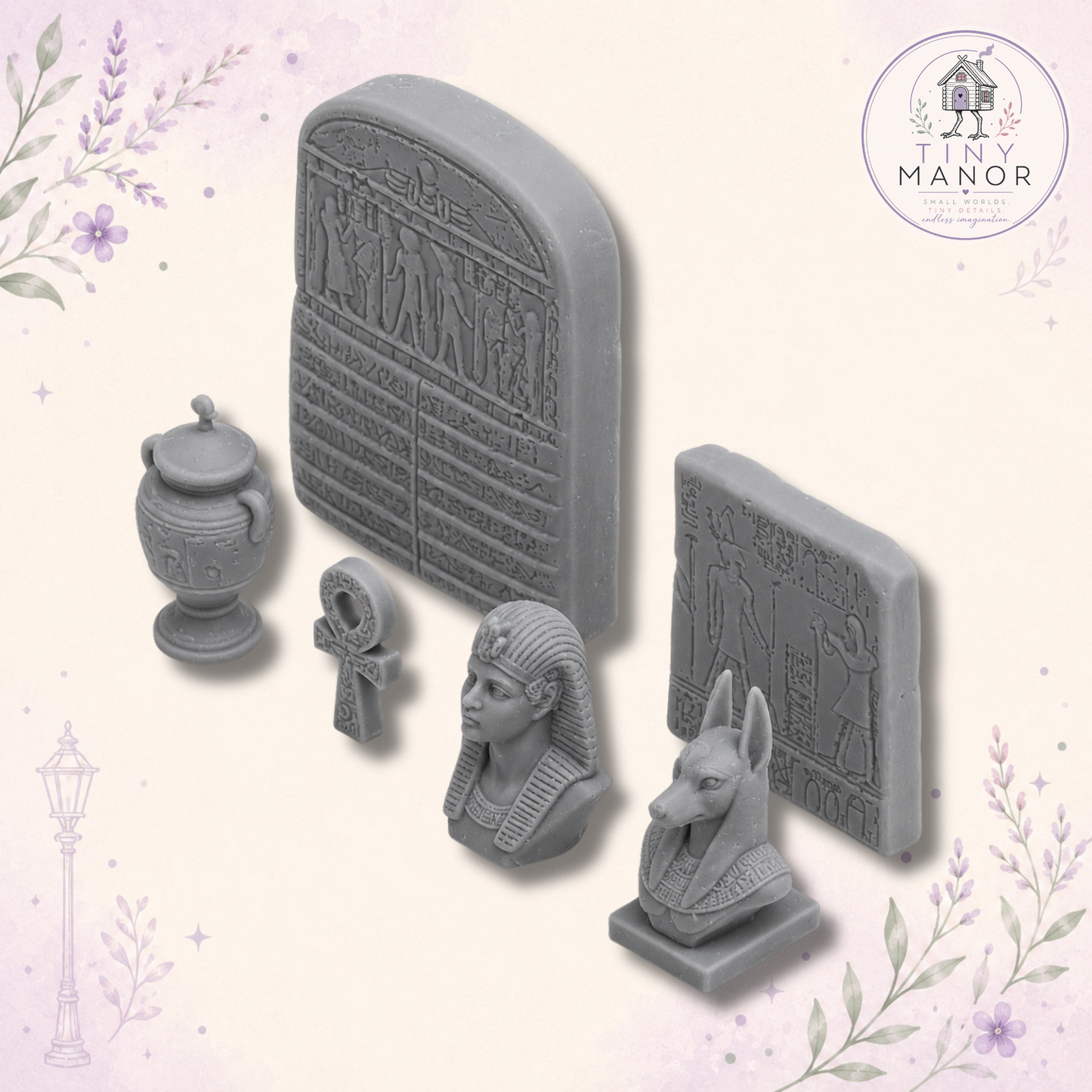 1:12 scale Egyptian Collection featuring six resin printed Ancient Egypt miniatures including Anubis, pharaoh bust, urn, ankh and carved stone tablets, supplied unpainted.