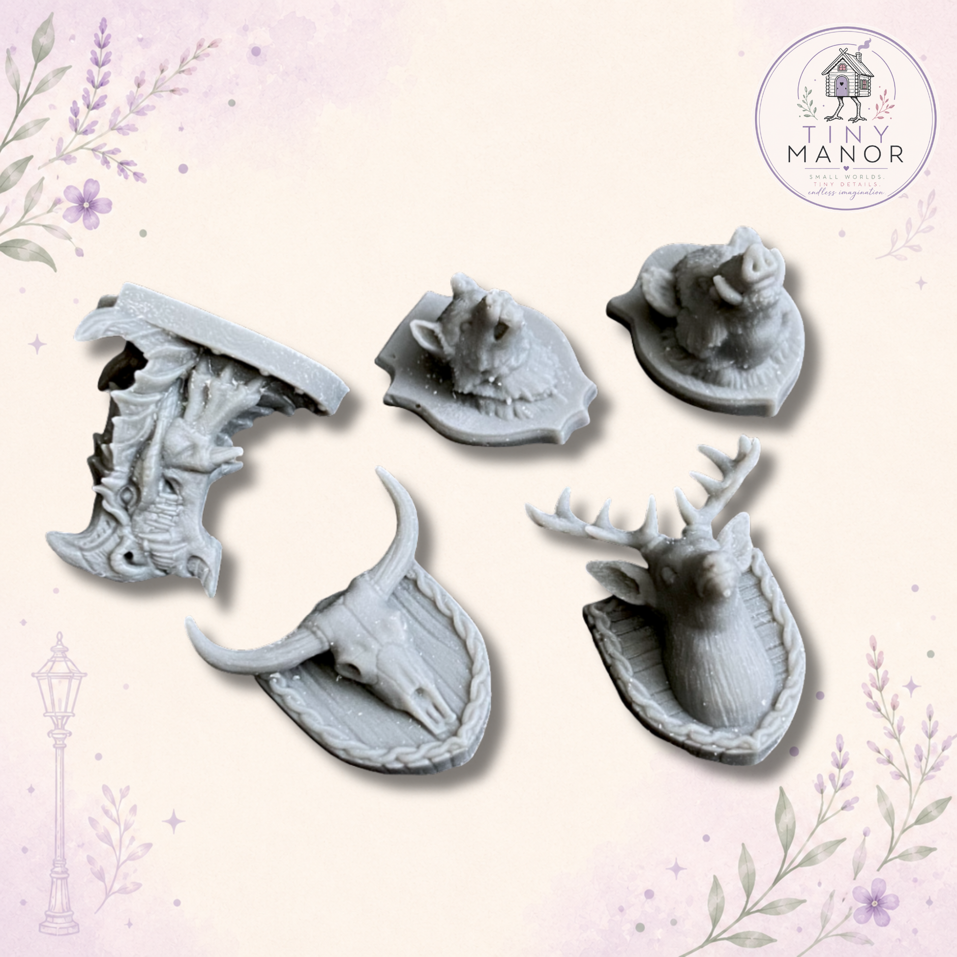 Set of five 1:12 scale resin printed miniature animal trophy heads for dolls houses, fantasy taverns, hunting lodges and medieval dioramas, supplied unpainted.