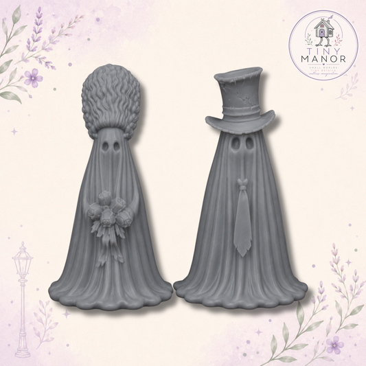 Unpainted grey resin ghost bride and groom wedding cake topper with bouquet, top hat and tie.