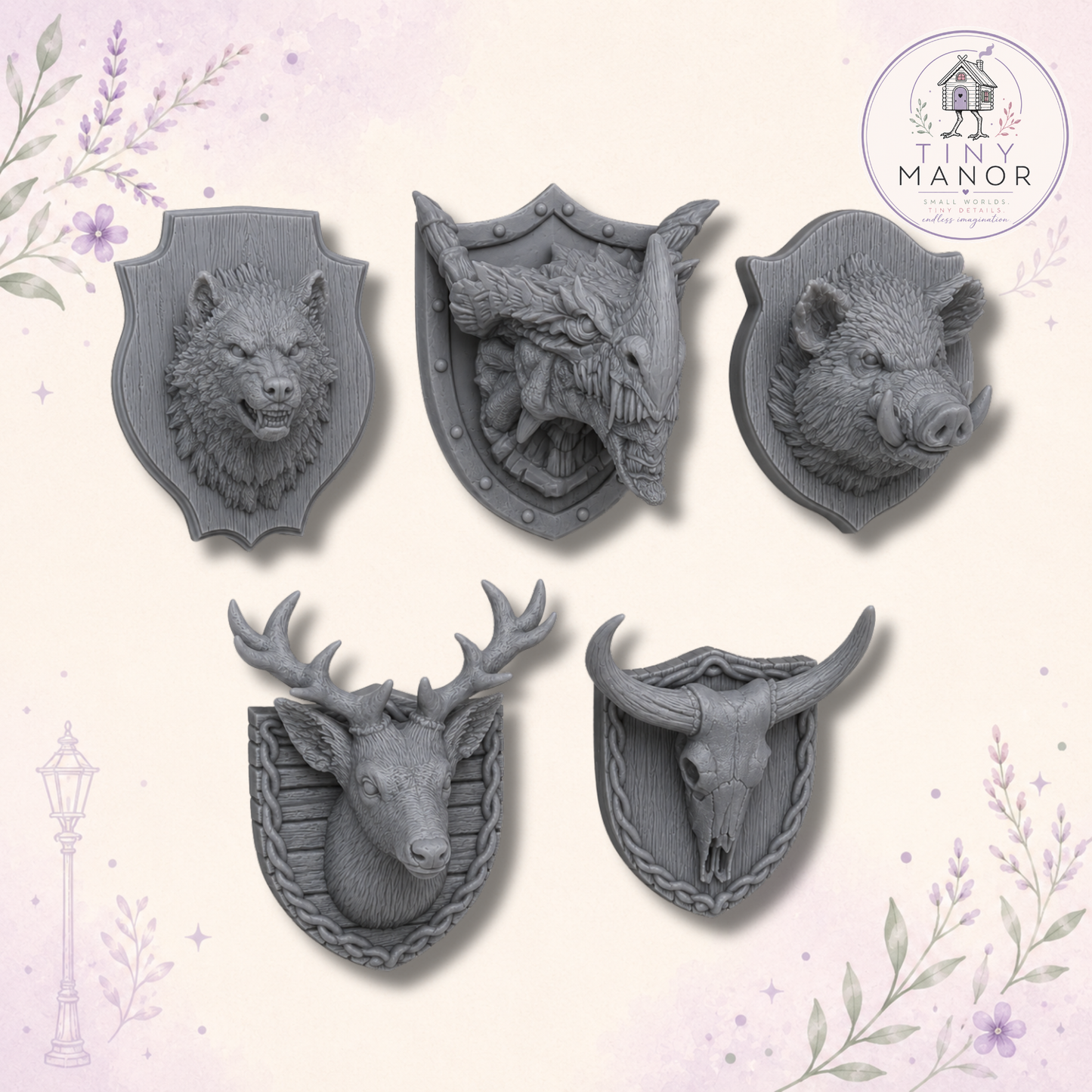 Set of unpainted grey resin miniature animal trophy heads including wolf, dragon, stag, boar and bison.