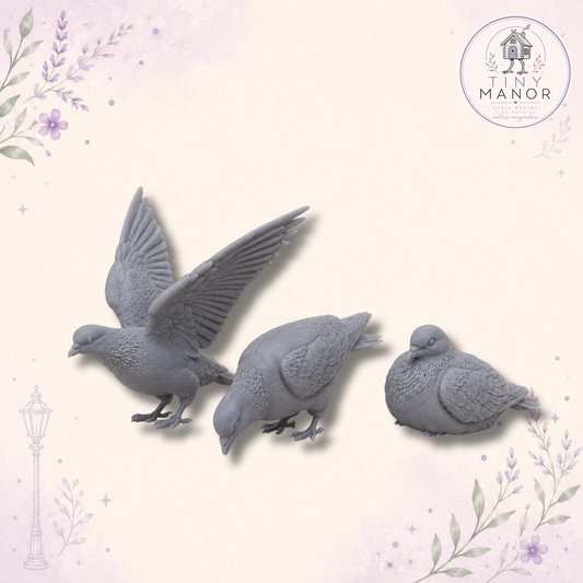 Three miniature resin pigeons in natural poses for dollhouses, dioramas and model scenes.