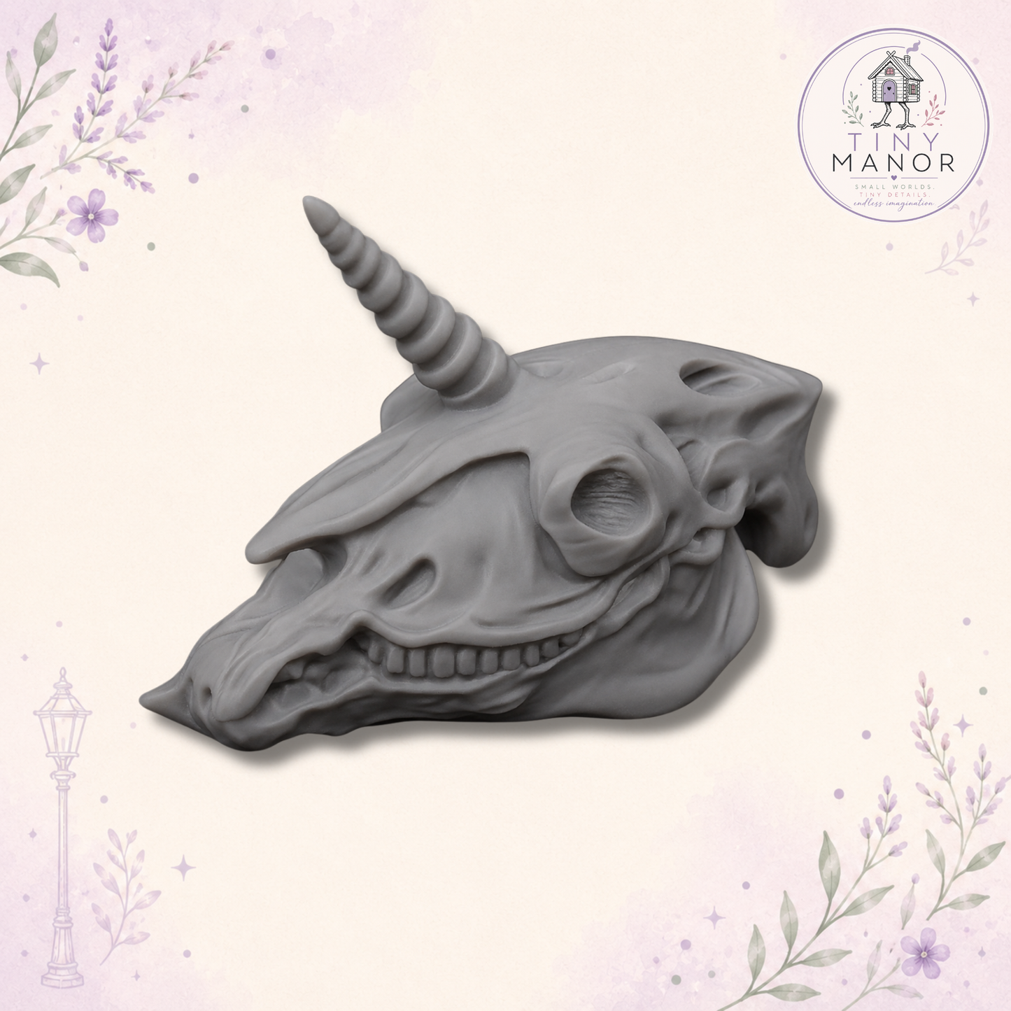 Unpainted grey resin unicorn skull miniature available in 3cm and 5cm sizes.