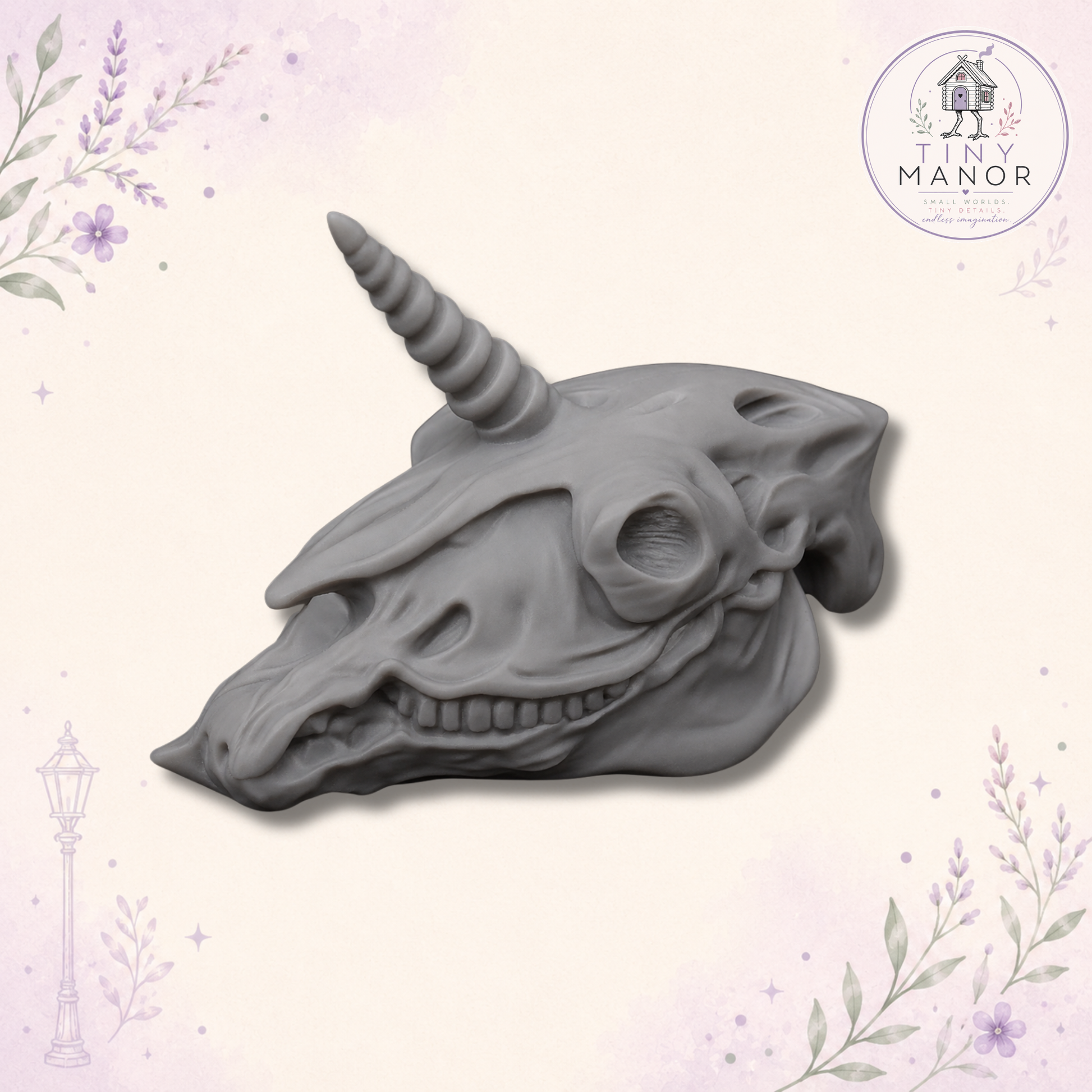 Unpainted grey resin unicorn skull miniature available in 3cm and 5cm sizes.